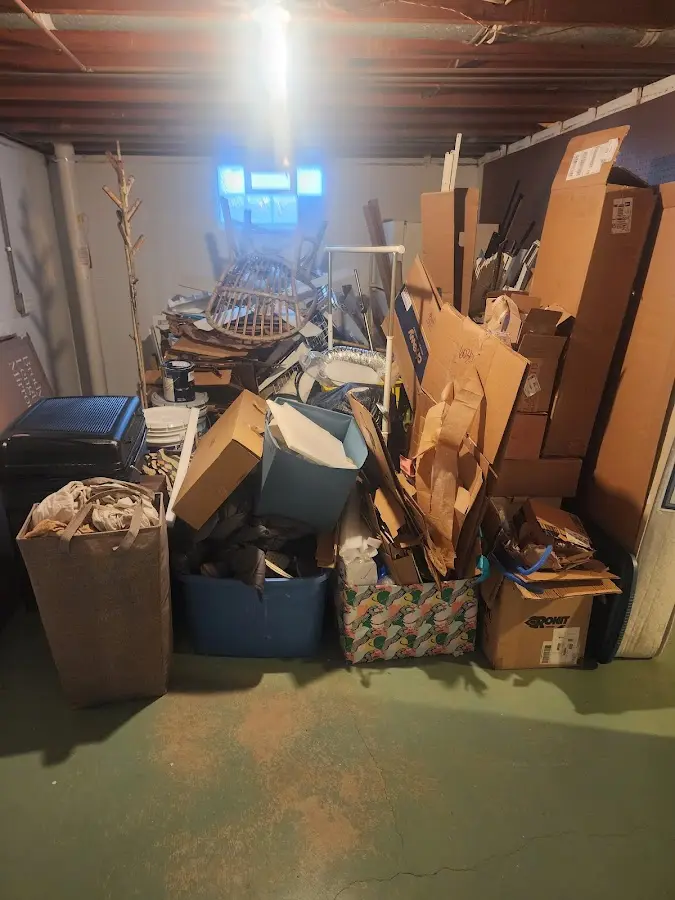 Roll-off dumpster container at job site for 20 Yard Dumpster Rental in Lake